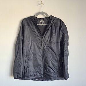 New Balance trackster woven wind-breaker with polka dot back